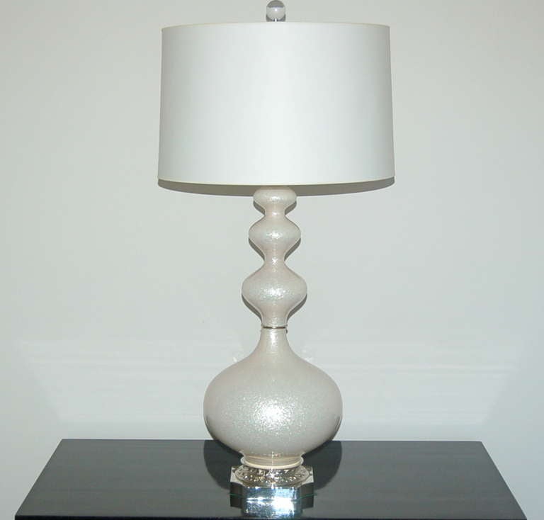 Curvaceous Murano lamps in eglomise style. Sparkly WINTER WHITE, cinched at the waist by nickel.  A very elegant, stylish pair!

The lamps are 30 inches tall from tabletop to socket top. As shown, the top of shade is 36 inches high. Lampshades are