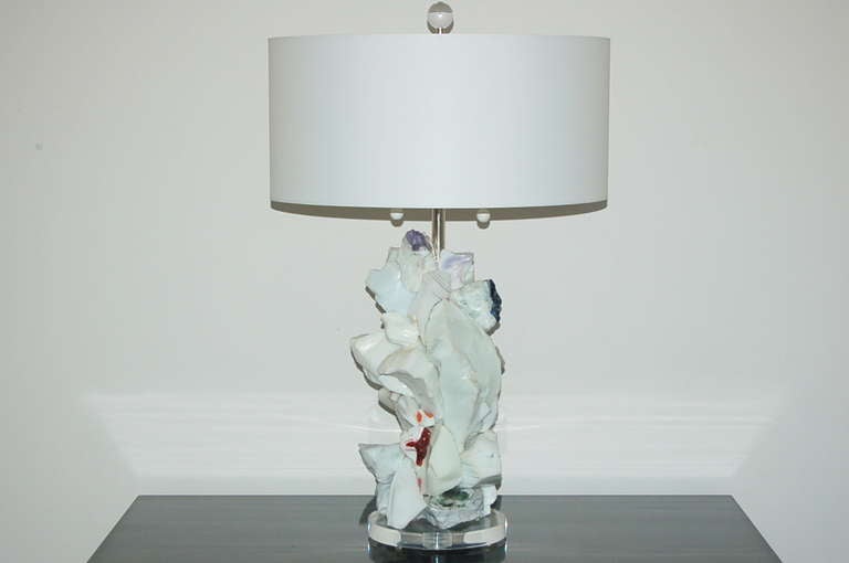 This beautiful cluster lamp of WHITE FROST is made of recycled glass.  A gorgeous Eco-friendly art piece that really lights up the room - how cool is that?
Designed by Swank Lighting. 

The lamp stands 25 inches from tabletop to socket top. As