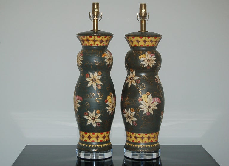 Imported from the province of Deruta in the 1960s, these monumental hand-painted CHARCOAL ceramic lamps are a stylish Classic. Mounted on Lucite bases and rebuilt with solid brass hardware.

The lamps stand 32 inches high from tabletop to socket