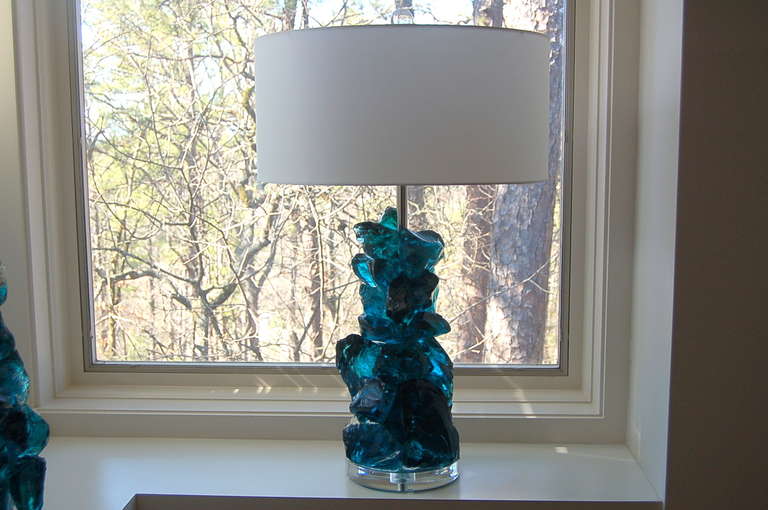 These exquisite cluster lamps in TEAL BLUE are made of 100% recycled glass. Gorgeous eco-friendly art pieces that really light up a room - how cool is that? They are designed by Swank Lighting.  The color is mesmerizing!

The lamps measure 27