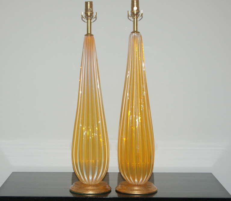 Hollywood Regency Pair of Towering Vintage Murano Lamps of Orange Opaline For Sale