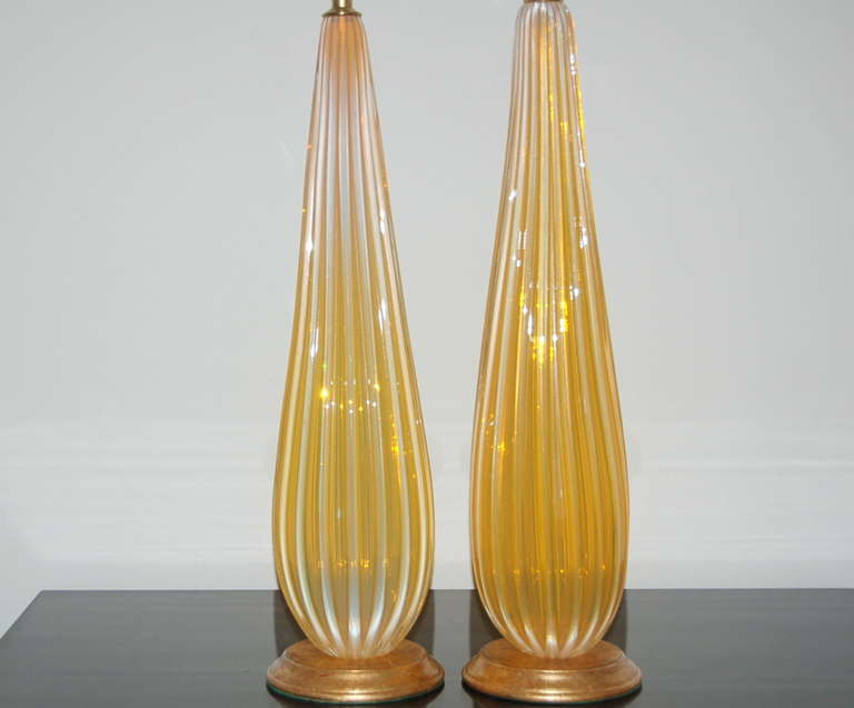 Italian Pair of Towering Vintage Murano Lamps of Orange Opaline For Sale