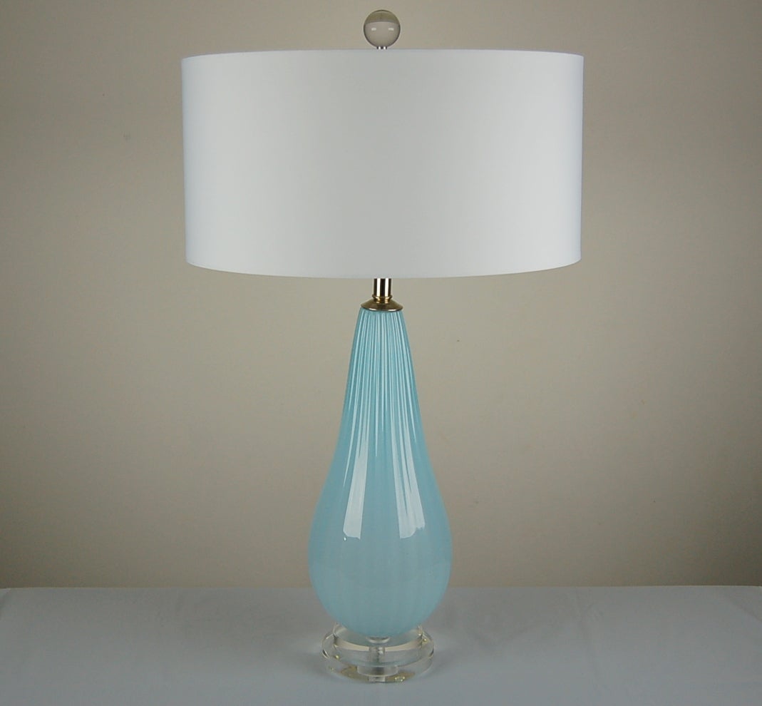 Simple teardrops in DREAMY SKY BLUE, from our earlier collection of handblown glass lamps by Joe Cariati, 2008. Hand signed and dated by the artist. Found in a mis-marked box at our warehouse - this is the last of the Blues. 

They Stand 22 inches