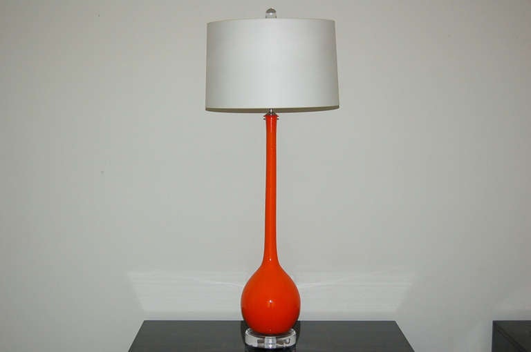 A perfect example of Mid-Century Modern style meets Op Art. The tall, slender neck and simple design are great representatives of the Eames era when RED ORANGE was the color du jour!

These lamps are 36 inches from tabletop to socket top. As