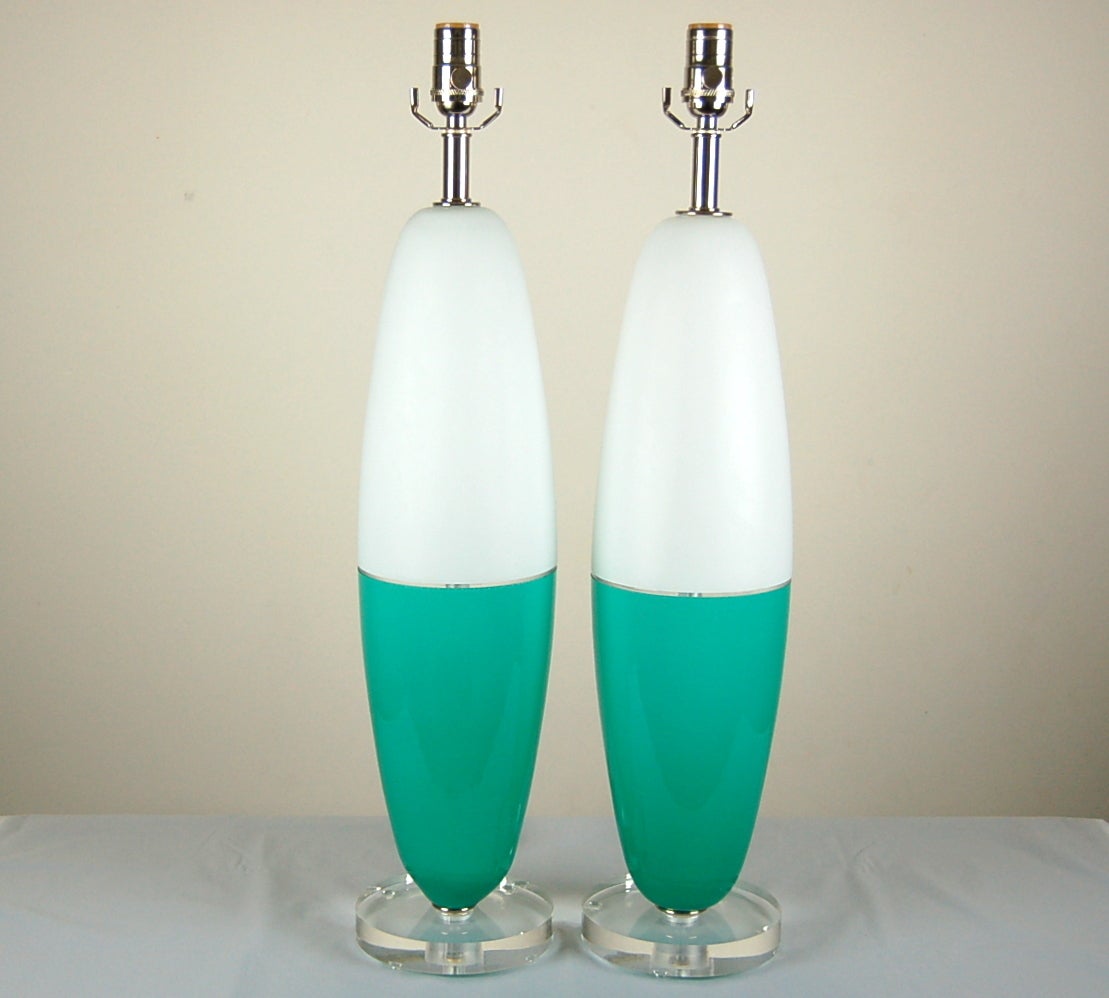 During the1960's, many designs were inspired by airplanes and rockets - these lamps being a perfect example. A wonderful blend of style and whimsy in and AQUA and WHITE! 

They stand 27 inches from tabletop to socket top. As shown, the top of