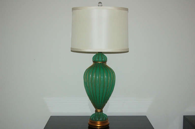 Vintage pair of Opaline Murano lamps in JULEP GREEN, by The Marbro Lamp company. Study the close up pictures and you'll the coin dot pattern in the glass. An extra special treat!

The lamps are 34 inches to the socket top. As shown, the top of shade