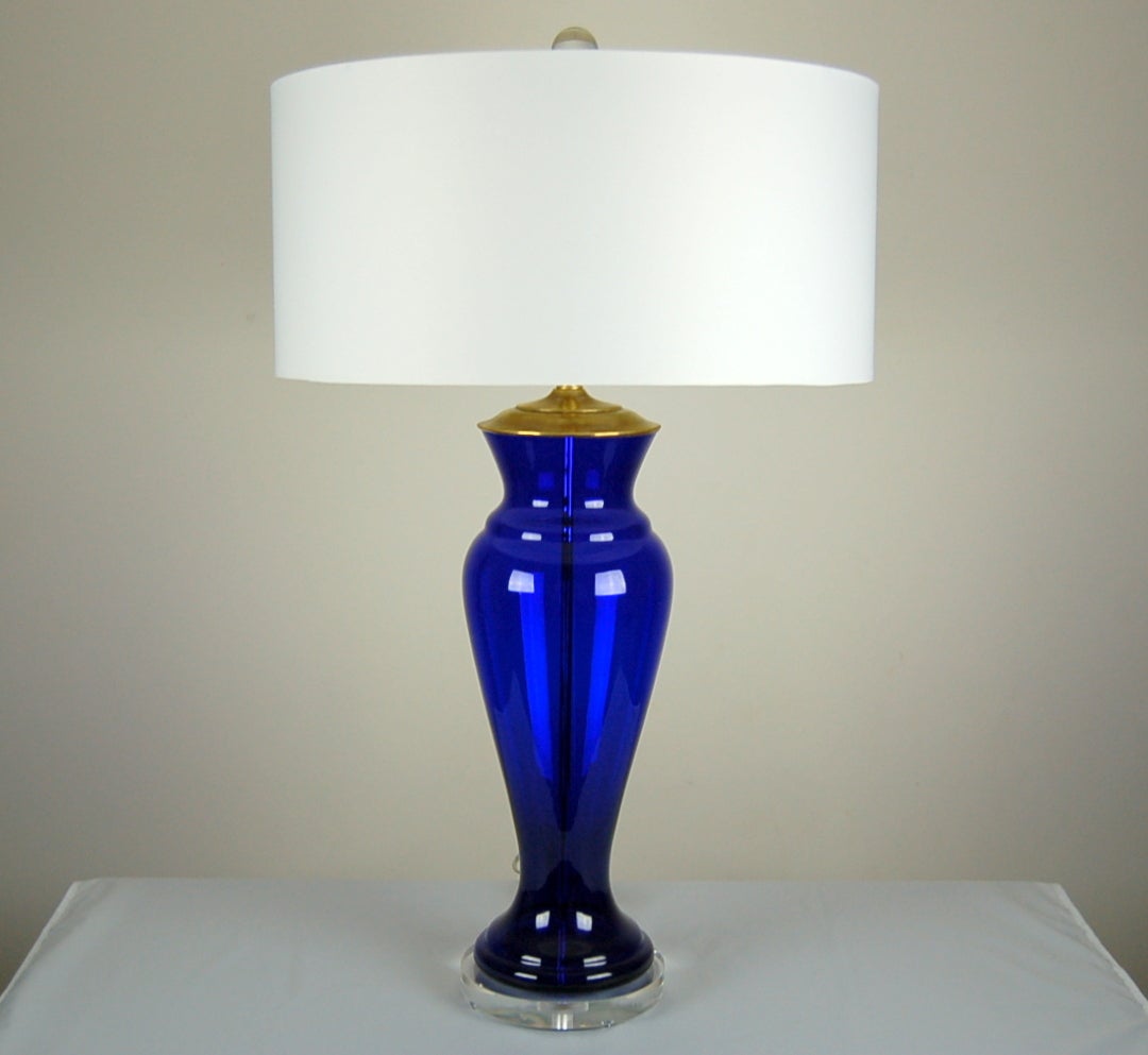 A simple urn shape becomes striking with color as intense as these Cobalt Blues. Tall, shapely, and gorgeous!.

They Stand 26 inches from tabletop to socket top. As shown, the top of shade is 31 inches high. Lampshades are for display only and not