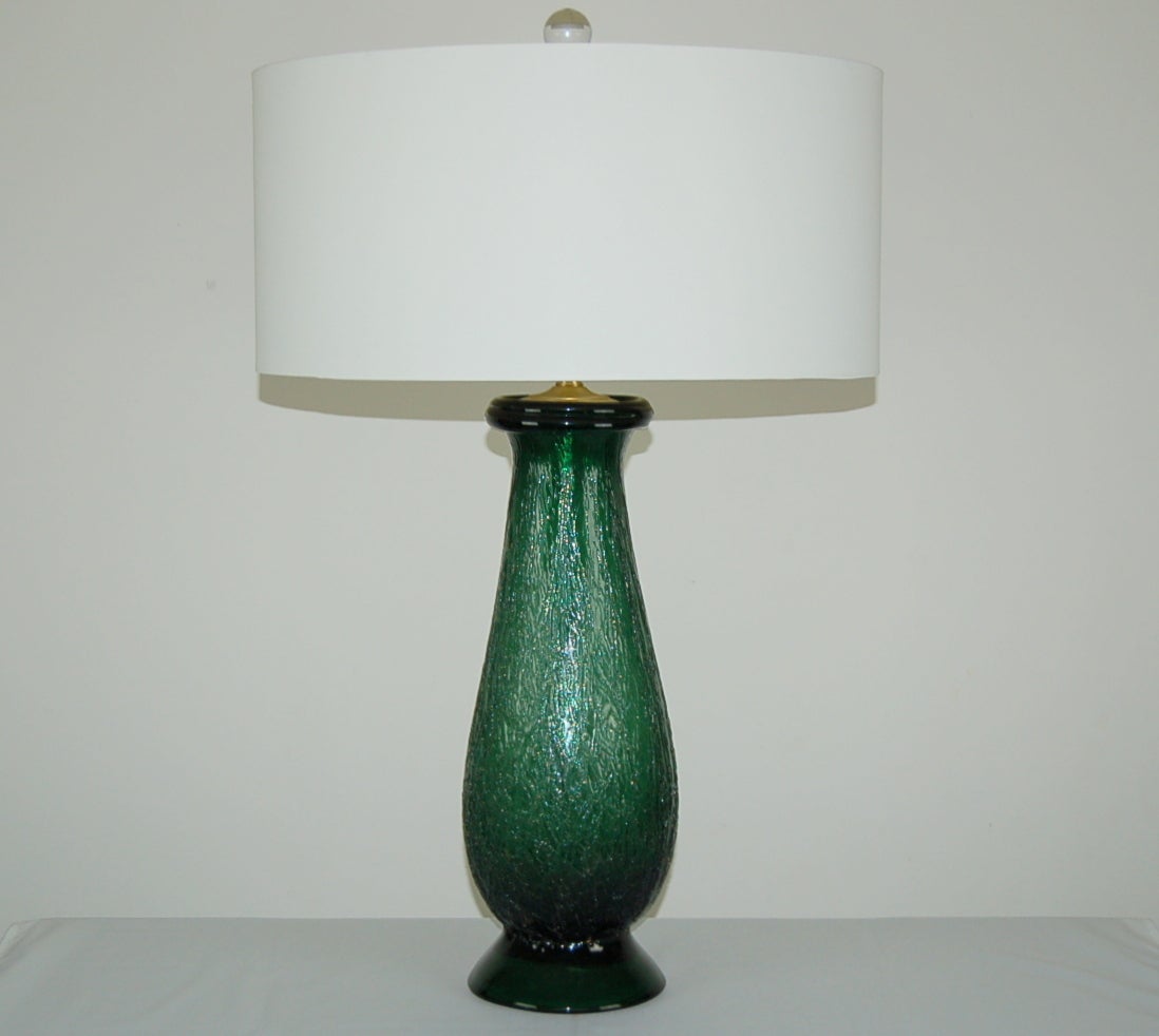 These Murano lamps of DEEP JADE GREEN are traditional, with a kick. Extremely thick glass with a heavily textured craqueleure finish - there is an almost faux bois look to them. 

The lamps measure 24 inches to the socket top. As shown, the top of