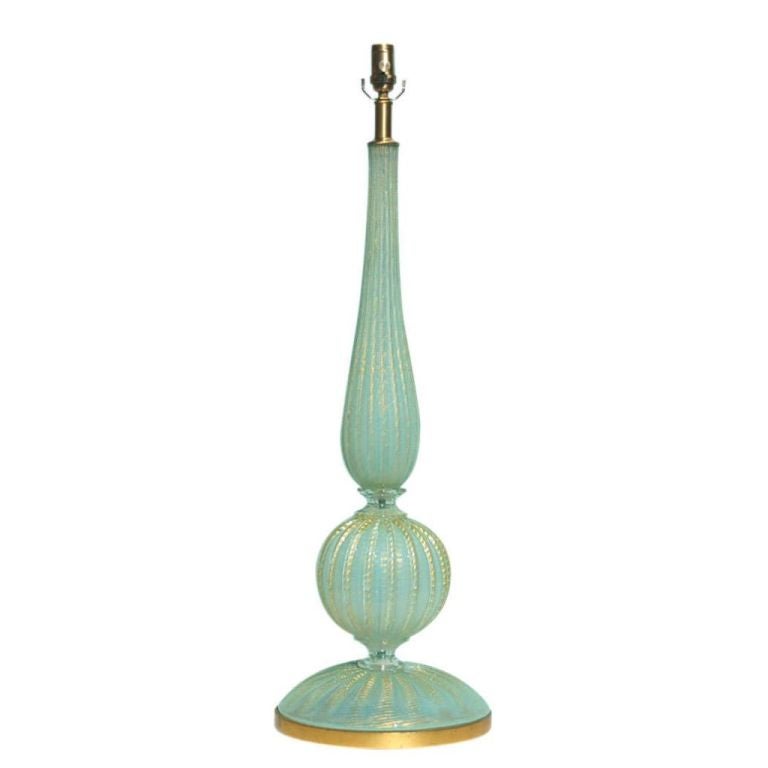 Exquisite, elegant, and imposing - three pieces of SOFT AQUA BLUE glass with tons of gold throughout.  This lamp is truly magical!

The glass pieces alone total nearly 32 inches in height.  The lamp is 38 inches tall to the socket top.  As shown,