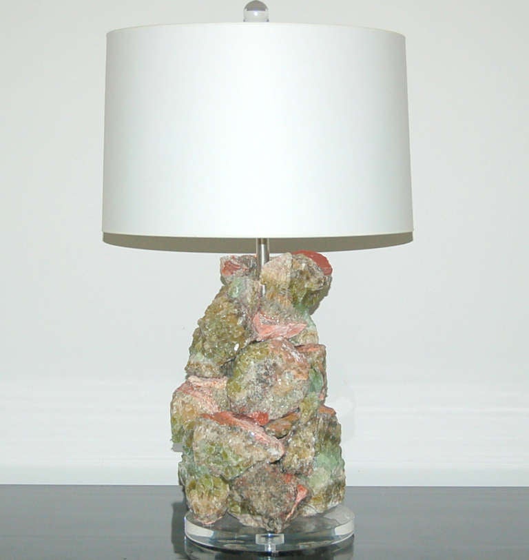 Spectacular sculpted lamps of Calcite imported from Brazil in the 1980s.  Visually soothing hues of green, from SAGE TO LIME. Each stone looks like a piece of carefully crafted jewelry. 

The lamps measure 27 inches from tabletop to socket top. As