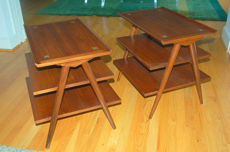 Stylish WALNUT three tier side table designed by Merton L. Gershun for American of Martinsville, circa 1960's. A of M released a full line of furniture fifty years ago with the X inlay. Top shelf has a reverse beveled edge. 

Each table measures