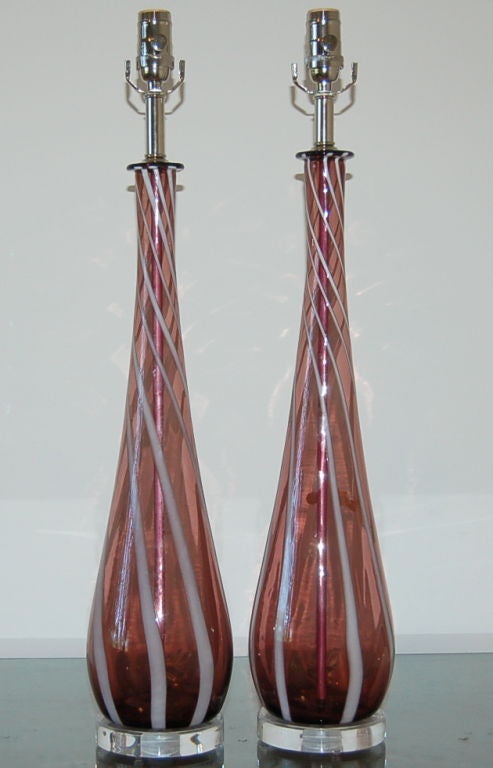 Graceful teardrop Murano lamps in deep AMETHYST with vertical stripes of WHITE, 1957. Tall and slender with a long and graceful neck. 

The lamps measure 28 inches from tabletop to socket top. As shown, the top of shade is 34 inches high.