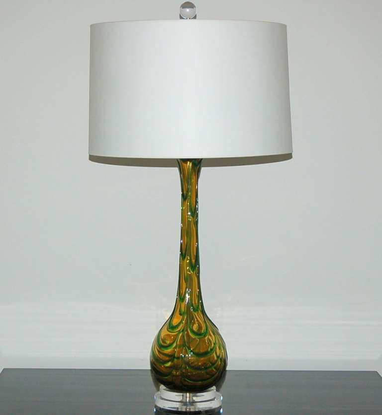 Pulled feather design of EMERALD GREEN applied glass draped over hand blown BUTTERSCOTCH glass.  A simple design with eye-popping colors with wonderful texture!

The lamps measure 28 inches from tabletop to socket top. As shown, the top of shade