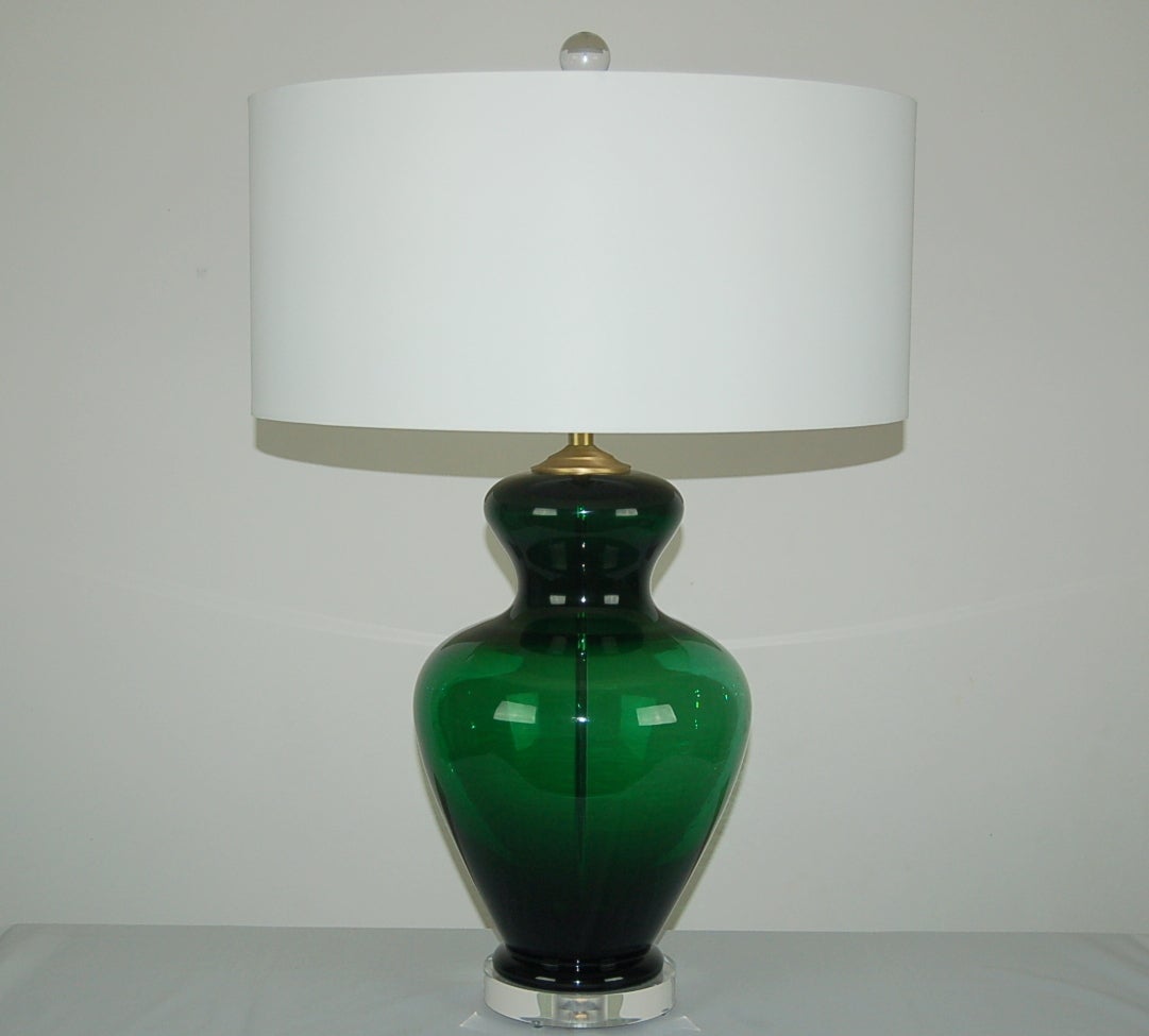 This matched pair of vintage Murano lamps is extra-chunky, in stunning EMERALD GREEN. Very curvaceous and, oh what a vibrant, elegant color!

They stand 22 inches from tabletop to socket top, and are 10 inches wide. As shown, the top of shade is