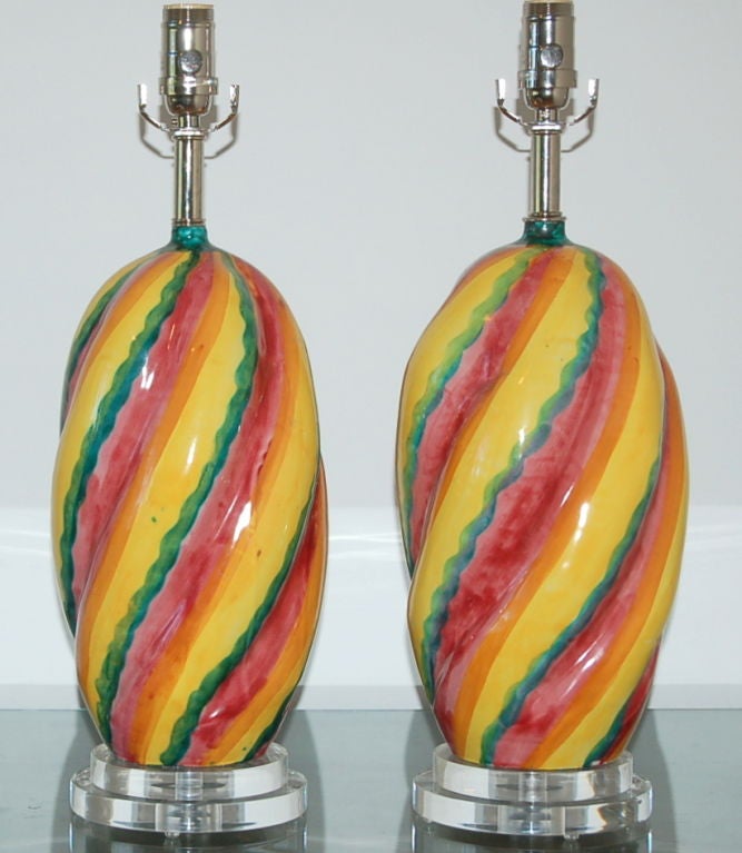 So you want a pair of colorful accent lamps but can't decide what color? Problem solved with these beautiful Italian ceramic lamps from the 1960s. We use stepped Lucite disc bases and nickel hardware so as not to detract from the diagonal