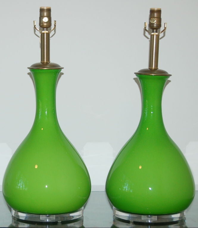 These Marbros are an intense APPLE GREEN that is so vibrant!  You walk into the room and BAM - there they are.  The original bronze hardware is gorgeous and the lamps look great mounted on Lucite chunks. 

They are 23 inches from tabletop to