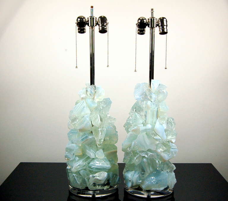 These sculpted glass cluster lamps in WHITE OPALINE are from the 