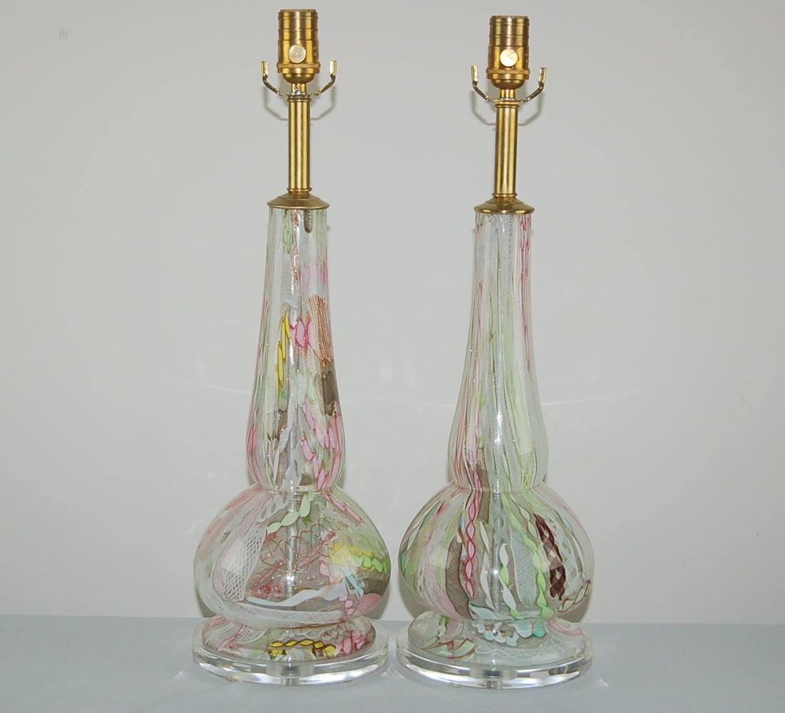 Wild and rare pair of TUTTI FRUITTI Murano table lamps, by Dino Martens. The technique was normally used for smaller decorative pieces, vases and bowls. Rarely was a pair of table lamps created in this style. Notice the various colorful, whimsical