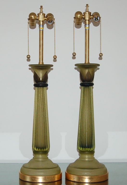 These beautiful Cenedese column lamps are a classic Marbro design, comprised of four pieces of Murano Acidato glass.  The glass is textural, as you can see in closeup photos.  Variations of Olive Green contrasted by the Black applied leaves gracing