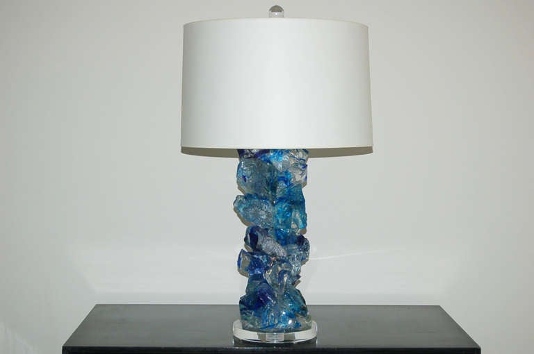 These beautiful glass cluster lamps in cobalt crystal are from the Rock Candy collection at Swank Lighting. The lamps are made of tumbled recycled glass.

They stand 25 inches to the top of the double cluster socket. As shown, the top of shade is
