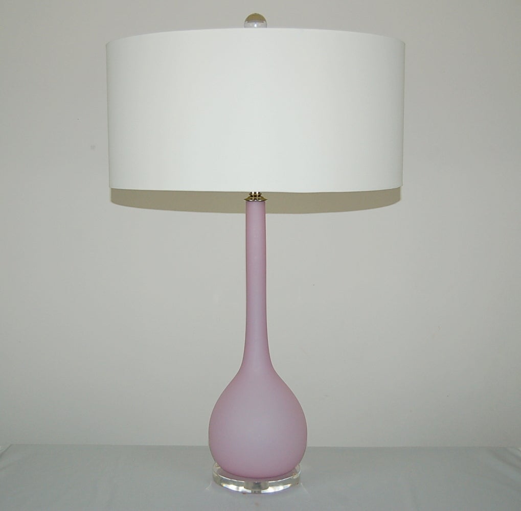 A very simple shape by Archimede Seguso - these in a wonderful ORCHID SATINATO, (pink, lavender) with matte finish. Elegant and cool - a perfect way to add some zip, and color, to the room.

The lamps measure 25 inches from tabletop to socket top.