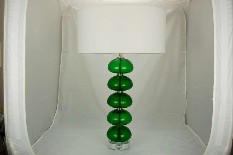 Crackle-textured Murano glass fonts stacked five high, like acrobatic Mentos, in a deep and vibrant EMERALD GREEN.  

The lamps stand 26 inches from tabletop to socket top. As shown, the top of shade is 31 inches high. Lampshades are for display