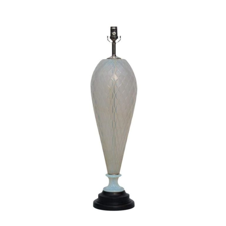 Classic inverted teardrop in white Opaline mounted on a dark chocolate base. The glass has a subtle diamond design and texture to it, giving it a quilted effect. Because of the Opaline, the glass has a very soft blue cast to it. 

The two glass