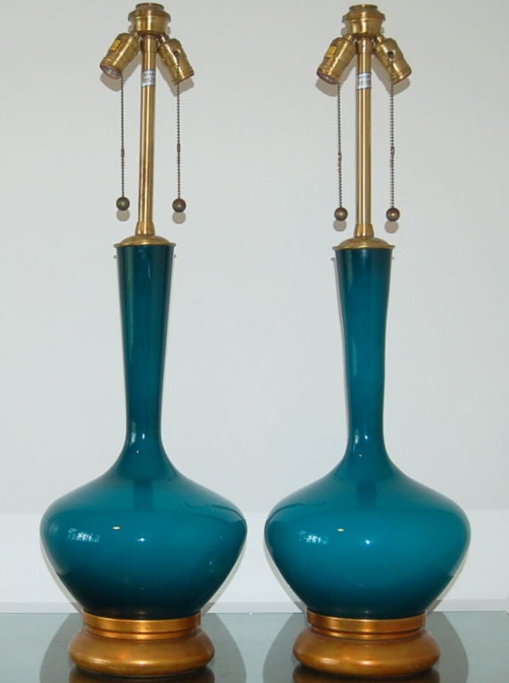We are proud to offer these Peacock Blue Marbro lamps, handblown in Sweden over fifty years ago.  There is an almost moody quality to the glass - as it is not translucent, the color has lots of vibrancy and depth.<br />
<br />
The shape is simply