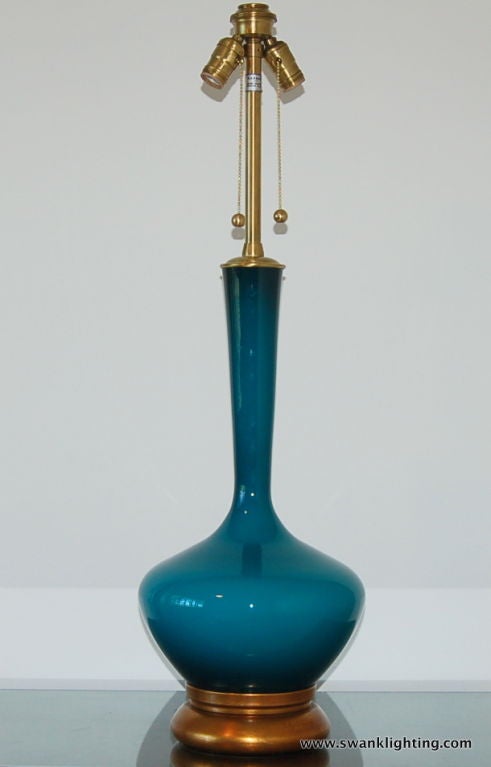 We are proud to offer this Peacock Blue Marbro lamp, handblown in Sweden over fifty years ago. There is an almost moody quality to the glass - as it is not translucent, the color has lots of vibrancy and depth.<br />
<br />
The shape is simply