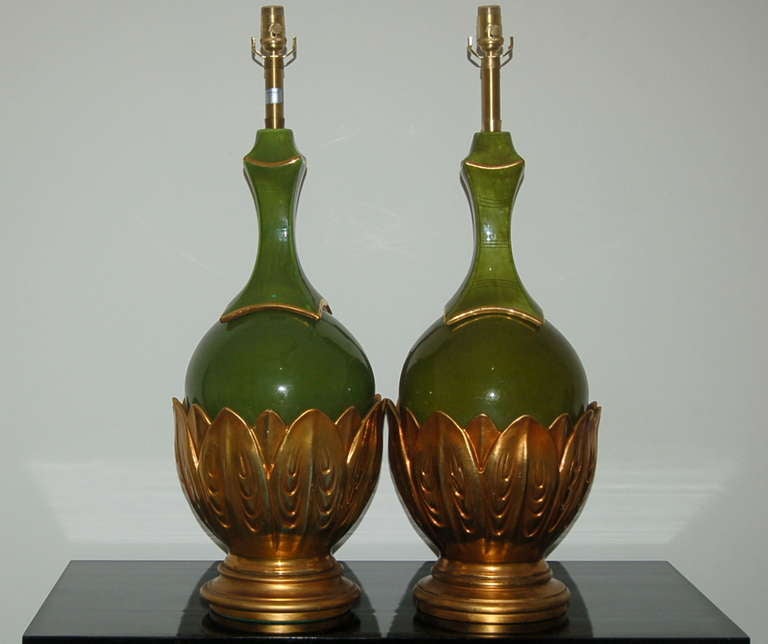 ENORMOUS pair of vintage matched ceramic Artichokes by The Marbro Lamp Company. Super wonderful AVOCADO GREEN lamps with Hand painted GOLD trim, mounted on gold finished bases. 

The lamps stand 34 inches from tabletop to socket top - they're a
