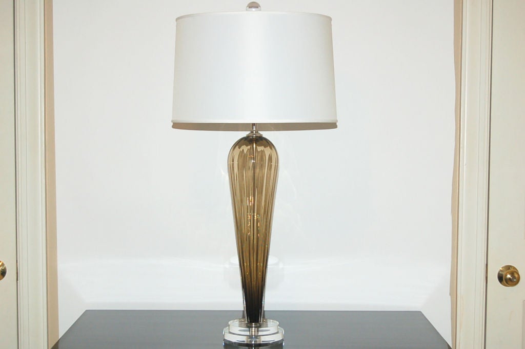 Exclusively blown for Swank Lighting by California artist Joe Cariati. These BRONZE lamps are signed by the artist. 

The lamps measure 24 inches from tabletop to socket top. As shown, the top of shade is 30 inches high. Lampshades are for display