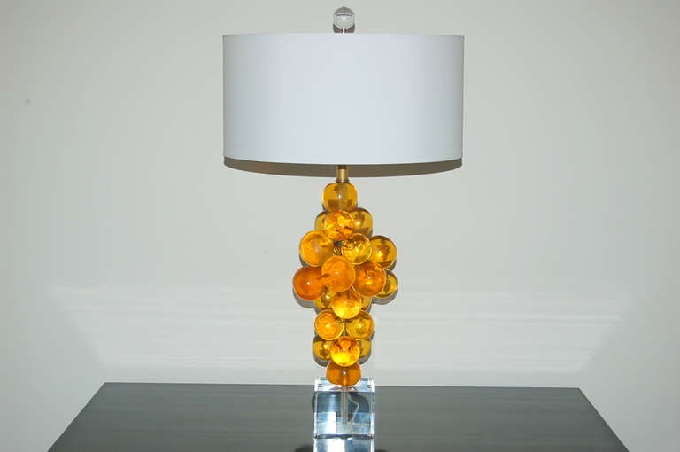 Such beautiful sculptures, in wonderful shades of butterscotch. These Bubble Lamps were created by Silvano Pantani, and imported from Italy in 1966. First time available for sale in 47 years. Gold, Amber, Yellow.

The lamps are 21 inches tall from