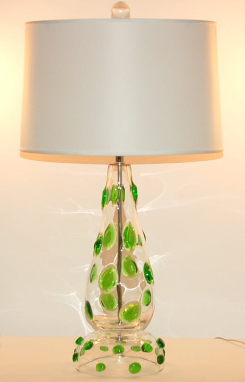 These lamps are so cool - vibrant EMERALD GREEN applied glass prunts all over the place!  This extremely rare pair is the perfect way to introduce candy colored polka dots to your decor.

The lamps measure 22 inches to the socket top.  As shown,