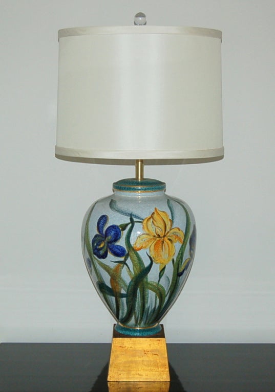 Gigantic hand-painted Italian porcelain lamp by The Marbro Lamp Company, circa 1968. Vivid Irises of cobalt an goldenrod, poised delicately on a large gilded plinth.

The lamp measures 30 inches from tabletop to socket top. As shown, the top of