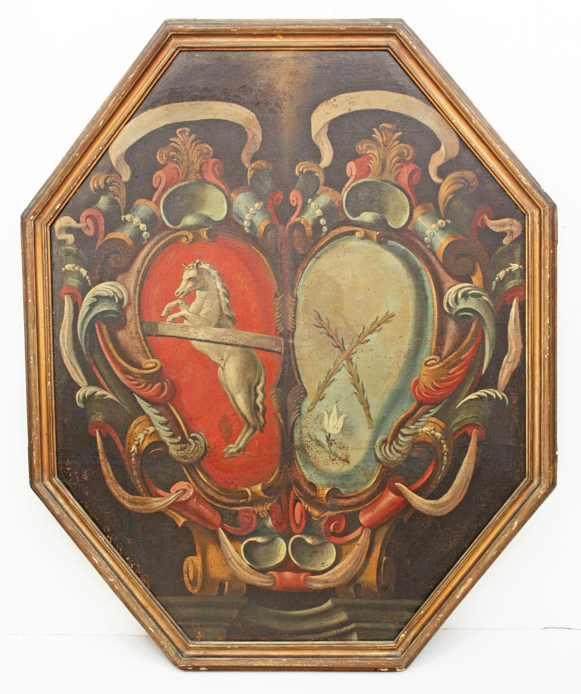 a large octagonal heraldic / armorial piece, oil on canvas, gilt frame, continental, perhaps France or Germany