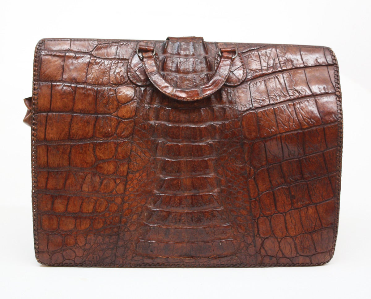 Vintage alligator briefcase in great condition with original key.