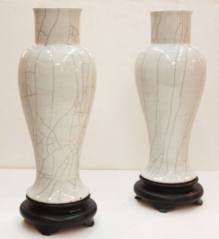 A pair of Chinese crackle ware vases....drilled. Stands included.
Height with stands 18