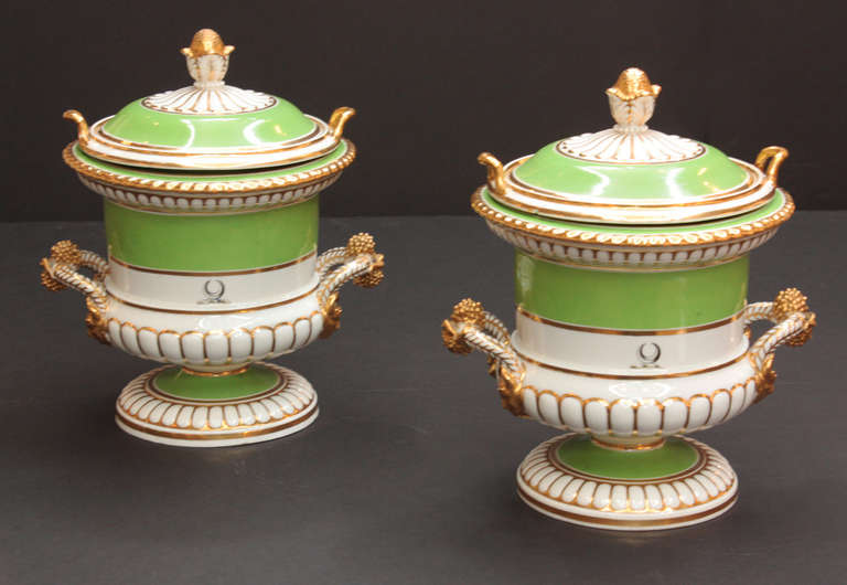 a pair of Chamberlains's Worcester porcelain fruit coolers, campagna form in  apple green and white with gilt handles and trim, signed under lid