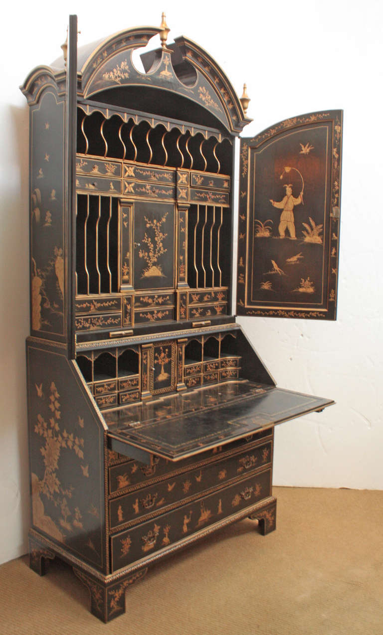 George I style black and gold lacquered bureau bookcase. Overall Chinoiserie decorated with figures in exotic gardens and pavilions