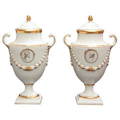 Pair of White Porcelain Lidded Urns