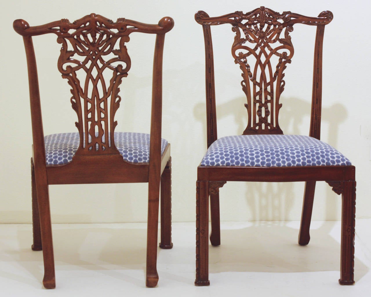 Set of 16 mahogany dining chairs, Chippendale style with ribband backs and Marlborough legs with blind fretwork by Maitland-Smith