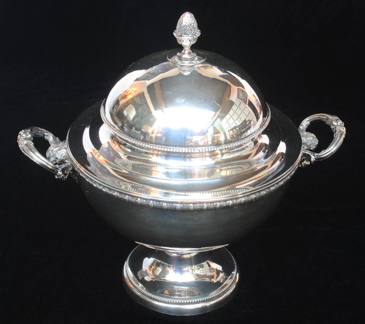 A Tiffany & Company, circa 1870, Sterling Silver Horse Racing Trophy, Dome-Lidded Tureen with Acorn Finial, Double-Handled with Rams Head Mounts, Egg and Dart Decorative Band at Top of Globular Body, on Pedestal Base with Beaded Border, Inscribed in