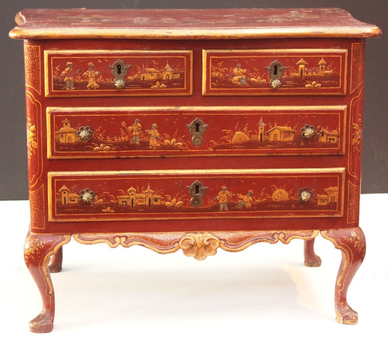 a miniature / small chest with red and gold Chinoiserie decoration, finished / decorated on the back, has one key