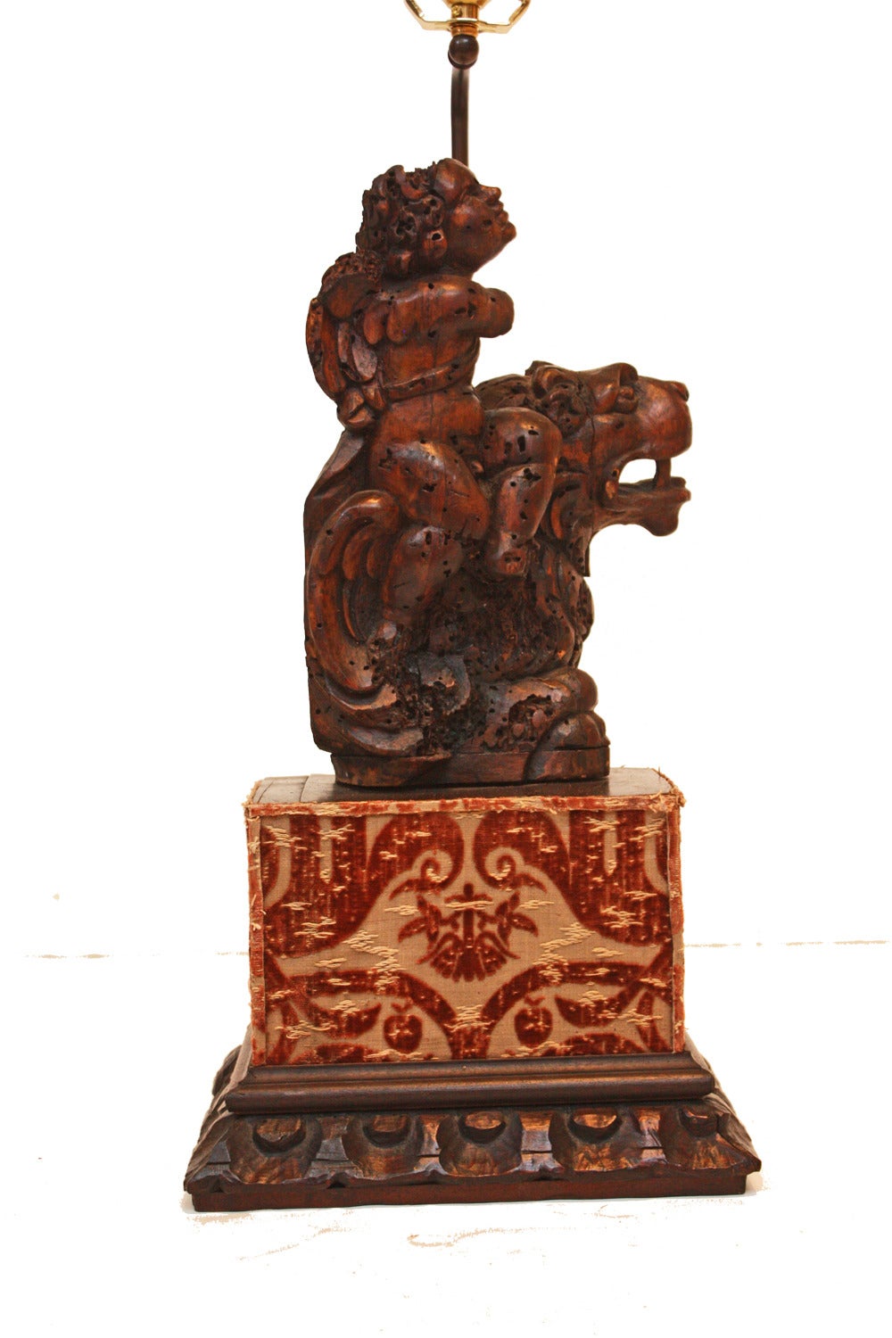 Pair of Italian walnut carved putti as lamps with custom shades and antique velvet bases