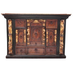 Bambocci Cabinet of Walnut and Ebony with Giltwood Figures