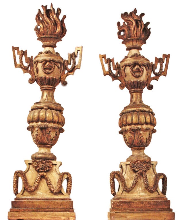 a pair of 18th century carved torchieres
51