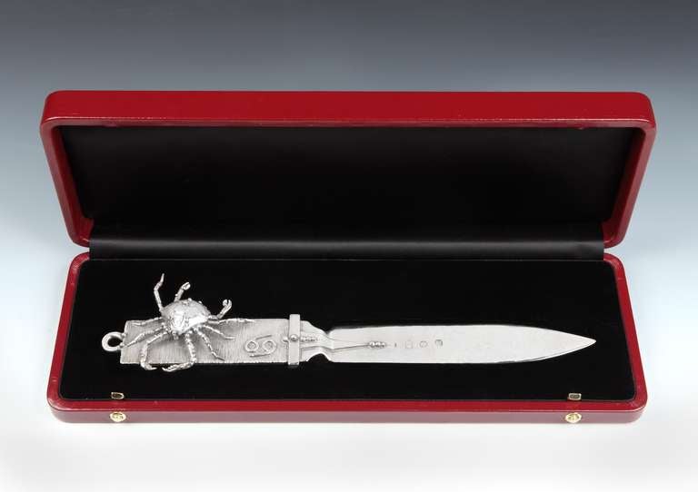 A very stylish Sterling silver paper knife or letter opener, with an applied silver 'crab' to the handle, and the Astrological sign for Cancer,  the body and blade with a hammered finish, and fully hallmarked with maker's marks and London marks for