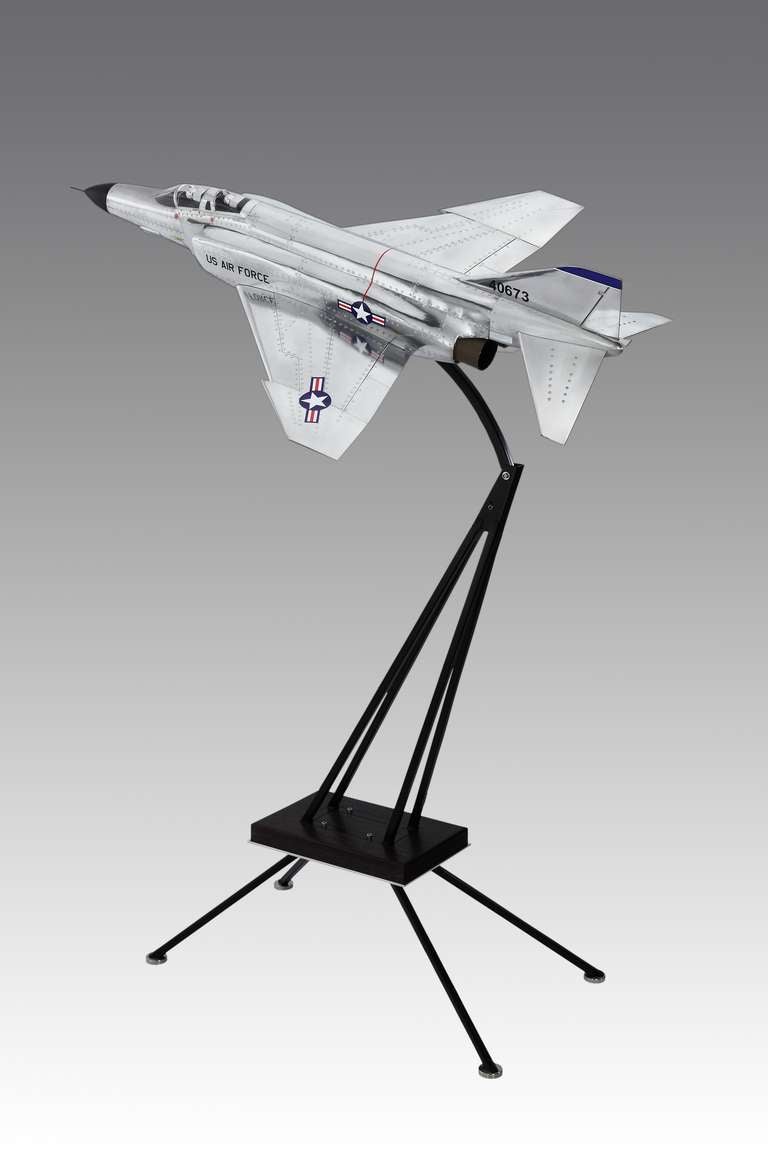 A magnificent and unique very large-scale aluminium sculptural model of a 1958 Boeing F-4 Phantom II jet fighter. 

The body, constructed in John Elwells signature style of hand formed aluminium panels riveted over a space frame, with two cast