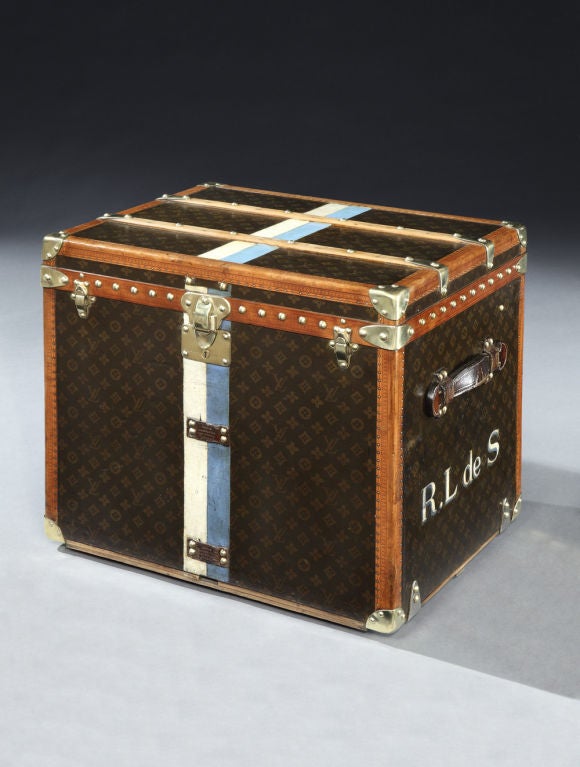 A fine example of the desirable ‘Cube’ trunk in classic Vuitton ‘Monogramme’ canvas with all-leather trim and handles, brass corners and locks, the interior in superb original condition with removable trays, bearing initials 'R.L de S' to each end,