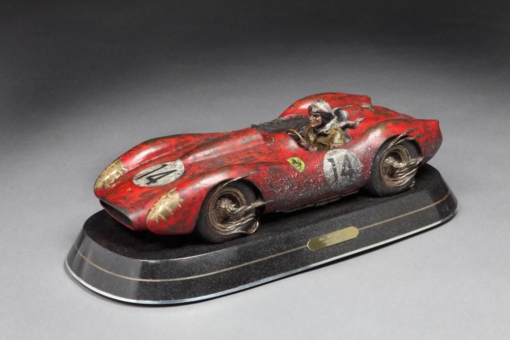 ‘Two Thoroughbreds’ a finely detailed, hand painted bronze depicting racing driver Phil Hill in Ferrari #14, racing in Le Mans in 1958. <br />
<br />
This particular model of bronze was cast in an edition of 50, this particular piece being the